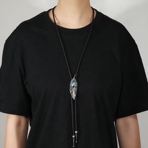 Retro feather bolo tie with turquoise stone and black braided leather cord necklace