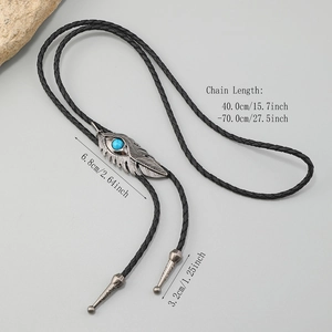 Vintage feather bolo tie with turquoise stone and adjustable black braided leather strap