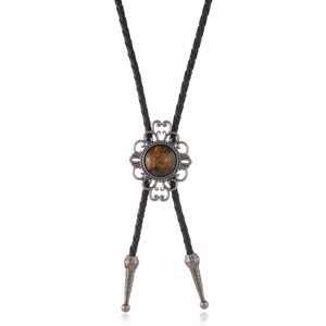 Cravate bolo fleurie vintage en argent avec œil de tigre et cordon en cuir tressé