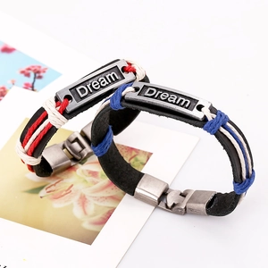 Braided leather bracelets for couples with metal 'Dream' charms in red and blue colors