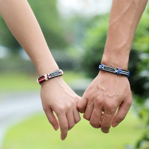Matching pair of Dream braided leather bracelets for couples in black, red, and blue tones