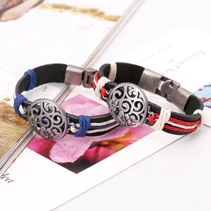 Ethnic handmade braided black leather bracelets with vintage silver metal charms for couples