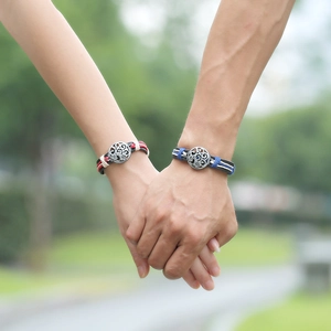 Ethnic minimalist leather couple bracelets with vintage silver floral pendants