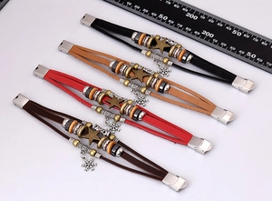 Multi-layer braided leather bracelet set with metal star charms and snowflake pendants