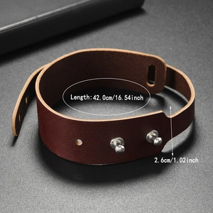 Brown leather wrap bracelet for men with silver metal stud closure on grey background