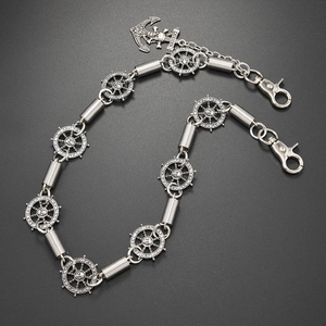 Punk style pants chain with anchor, steering wheel and skull charms in antique silver