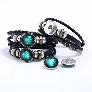 Multi-layer leather zodiac bracelet with interchangeable glass snap button designs