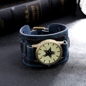 Macro shot of punk style leather watch with star dial and bronze metal casing