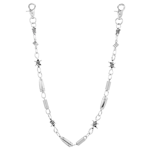 Punk silver metal pant chain with barbed wire, bullet charms and dice on white background