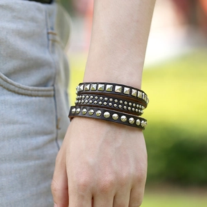 Men's punk leather bracelet with triple wrap layered design and silver metal rivets