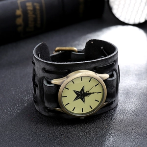Close-up of vintage punk leather watch featuring a bronze star dial and hollowed black band
