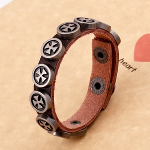 Vintage dark brown leather punk bracelet with Maltese cross studs and adjustable metal snaps