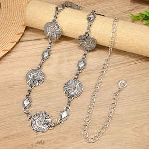Bohemian silver metal chain belt with ornate circular carvings for summer dresses