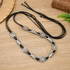 Western vintage PU leather belt with engraved metal sunburst patterns for boho style