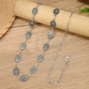 Vintage bohemian metal waist chain with oval turquoise stones and silver flower patterns
