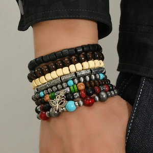 Bohemian multilayer wood bead bracelet set with turquoise accents and butterfly pendant