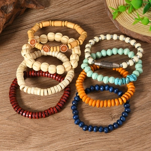 Detail view of 8-piece multilayer handmade wooden beaded bracelets set in bohemian style