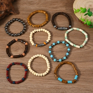 Detailed collection of 10 bohemian beaded bracelets with natural wood and stone beads