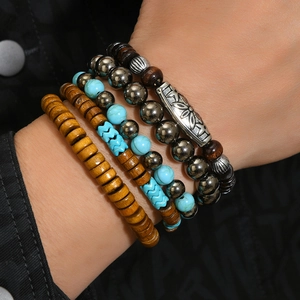 Bohemian 4-piece stacked beaded bracelet set with turquoise and wooden accents