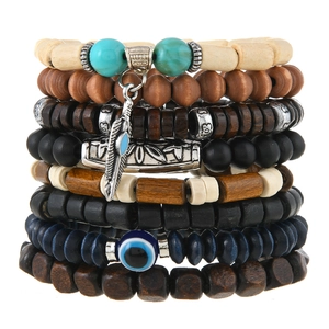Bohemian multilayer wood bead bracelet set with vintage feather pendant and evil eye charm