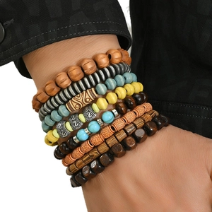 Set de 8 bracelets en perles de bois style bohème et perles en alliage vintage pour homme
