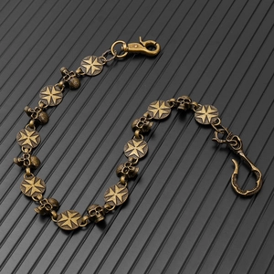 Detail of vintage skull and cross link chain for hip hop and biker style accessories