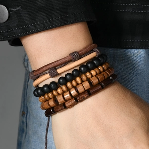 Retro multi-layer bracelet set with coconut shell beads and leather cords on wrist