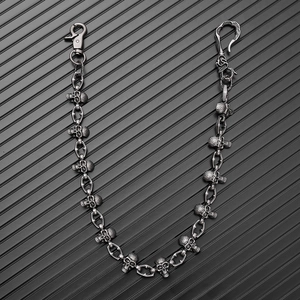 Close-up of vintage gothic skull wallet chain with heavy metal links and lobster clasp