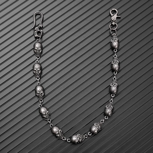 Detail of gothic punk skull trousers chain with antique silver finish and lobster clasps