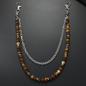 Detail view of double-layer waist chain with tiger eye beads and silver metal link