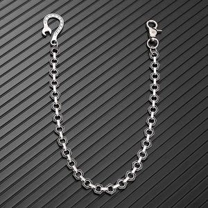 Detail of vintage punk metal wallet chain with hexagonal links and swivel snap hook