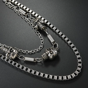 Three-layer punk hip hop wallet chain with skull pendants and vintage silver finish