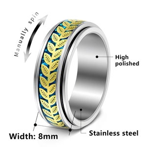 8mm stainless steel spinner ring with gold leaf texture and blue carbon fiber inlay