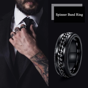 Men's black stainless steel spinner ring with rotating chain design in punk style