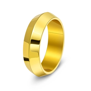 Macro detail of gold-plated punk style ring featuring geometric multi-faceted edges