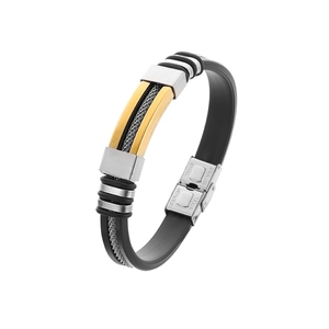 Detail of men's titanium steel bracelet showing stainless steel clasp and gold inlay