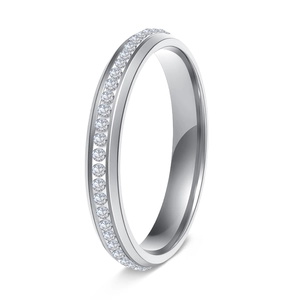 Detailed macro view of a 3mm stainless steel ring with channel-set sparkling crystals
