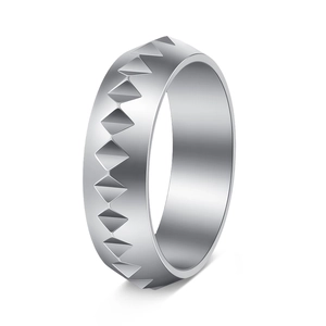 Detailed macro view of the silver titanium steel ring with geometric pyramid texture
