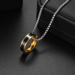 Minimalist black and gold stainless steel ring pendant necklace with a box chain