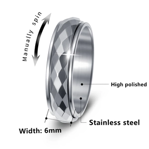 Manual spinning 6mm stainless steel spinner ring with geometric diamond faceted surface