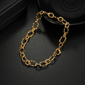 Golden chunky chain bracelet with twist texture links and secure lobster clasp closure