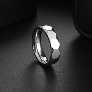 Polished silver titanium steel honeycomb ring with geometric hexagonal mirror facets