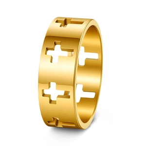 Detailed view of wide gold stainless steel ring with hollow cross pattern and polished finish