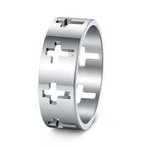 Detailed close-up of hollowed-out cross patterns on a silver titanium steel ring