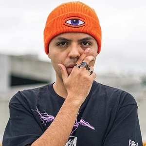 Hip hop titanium steel rings set with bright orange evil eye embroidery beanie hat