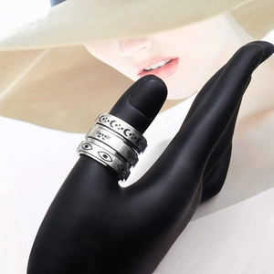 Three-piece stainless steel anxiety rings set with moon star and evil eye motifs