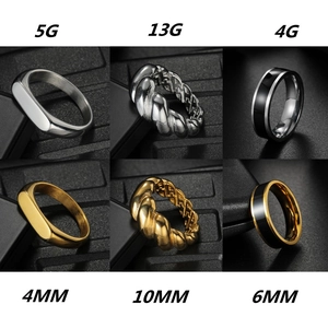 Detailed comparison of gold and silver steel rings showing different widths and weights