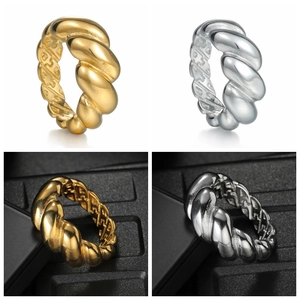 Polished gold and silver bold croissant dome rings in twisted stainless steel design
