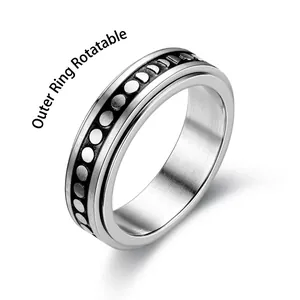 Brushed stainless steel spinner ring with moon phase pattern and rotating outer band