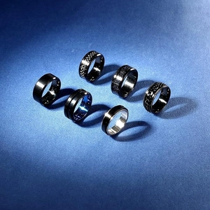 6-piece men's 8mm stainless steel rings set in black and blue finishes on dark background